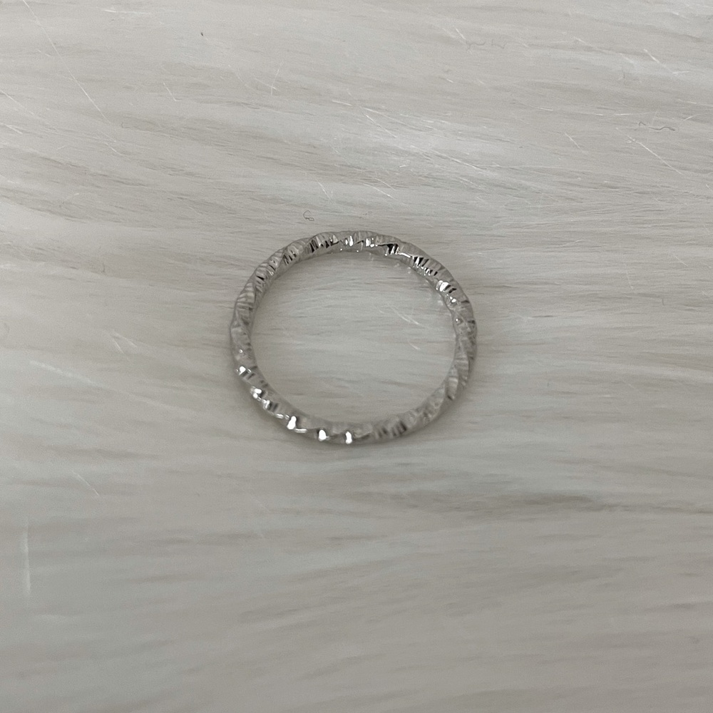 Beautiful hammered finish, silverplate ring, size 7. Compliments any outfit.